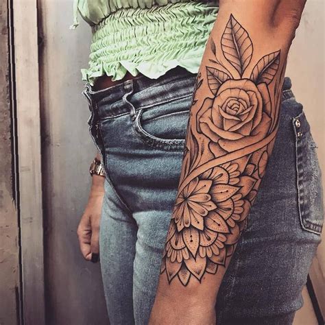 women's side arm tattoos